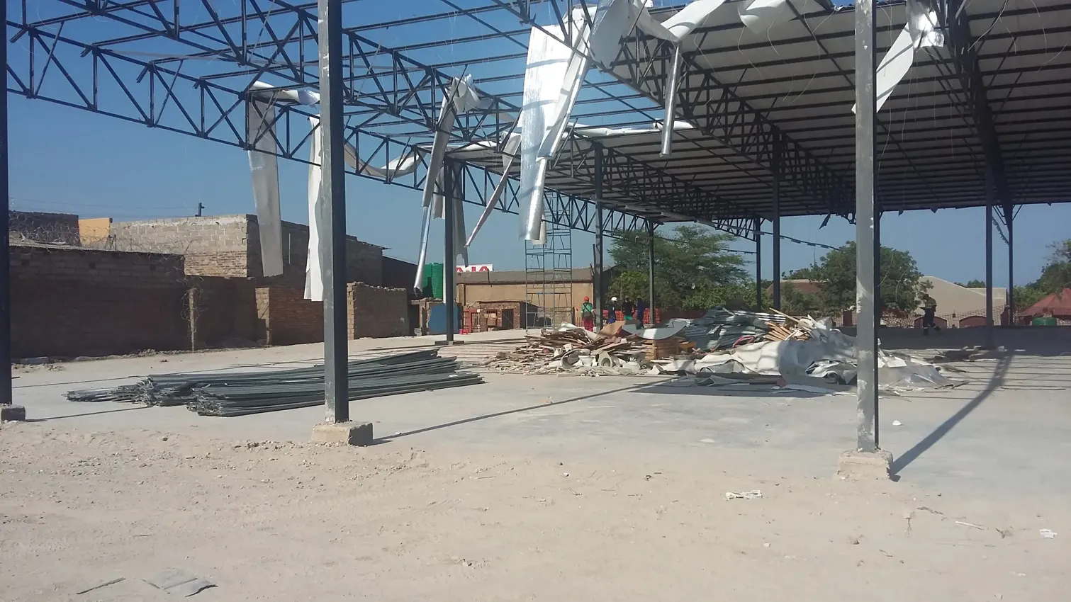 Image of demolition-of-a-warehouse-between-buildings-2.webp